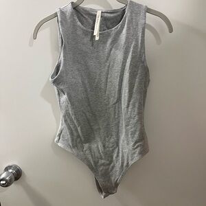 Group by babaton body suit